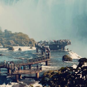 Tourists marvel at the breathtaking Iguazu Falls, a UNESCO World Heritage Site.